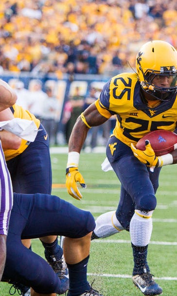 West Virginia slips past K-State with 14-point fourth quarter
